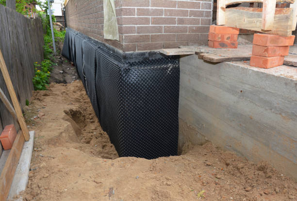 Happy homeowners after waterproofing job in Amanda
